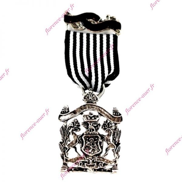Broche blason décoration récompense métal argenté ruban rayé noir et blanc