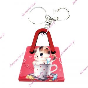 Porte-clés bijou de sac cabas sac rouge plexiglas motif chat amoureux dans tasse bonbons