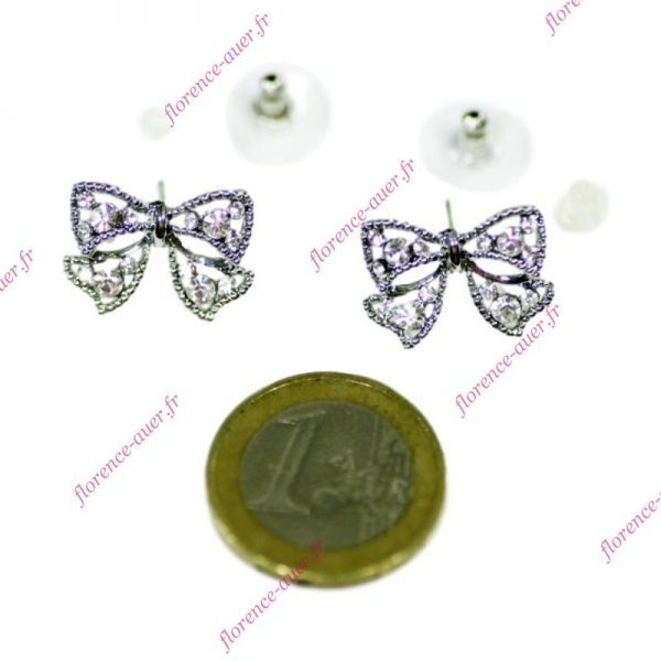 Boucles d'oreilles argentées magnifique nœud ruban strass blancs