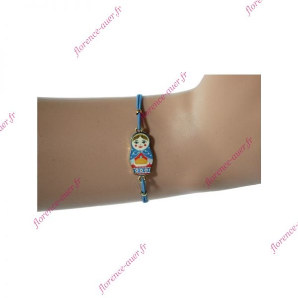 Bracelet cordons élastiques bleus charmante poupée russe