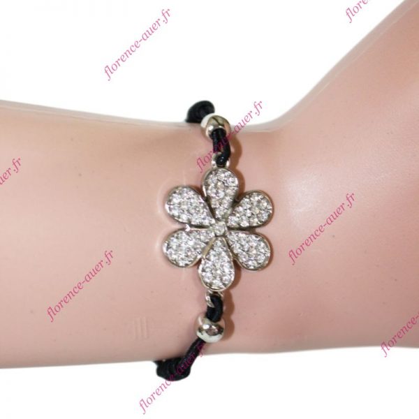 Bracelet fleur marguerite argentée cordon noir élastique strass blancs